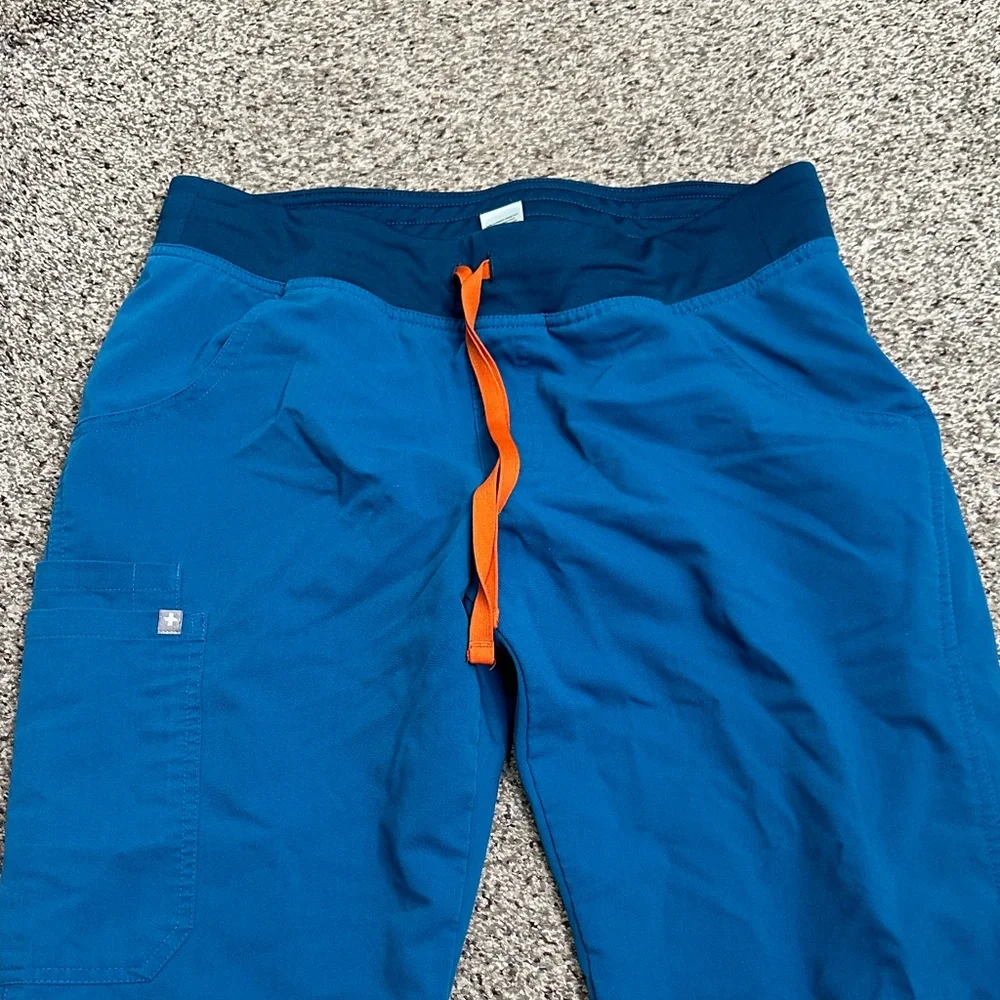 Figs teal Blue technical scrub Pants with Orange Drawstring size M
